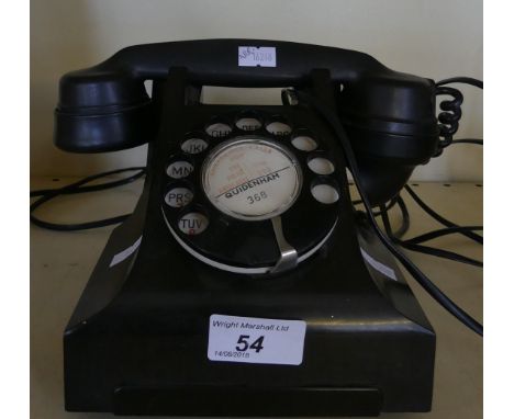A vintage black Bakelite GPO telephone CONDITION REPORT: Yes the telephone does have a modern BT wall connection 