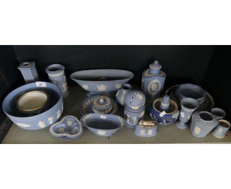 A mixed lot of various Wedgwood blue Jasperwares to include vases, bowls, tea caddy, table lighter, candlestick and other ite