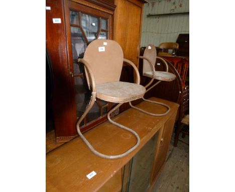 A pair of Vintage metal children's chairs
