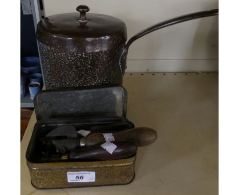 A collection of vintage bull's head and other tin openers, together with a small copper lidded pan