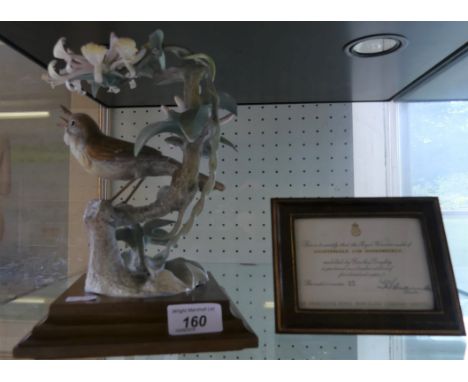 Royal Worcester Nightingale and Honeysuckle modelled by Dorothy Dowty, with certificate. CONDITION REPORT: Chips/losses to se