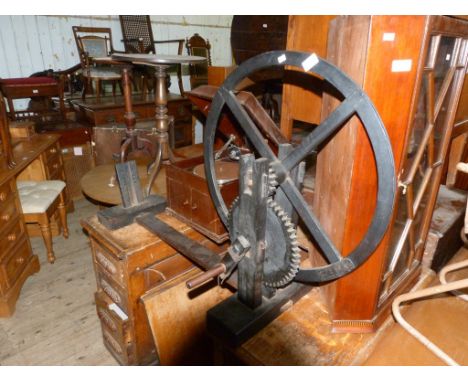 A vintage wooden cotton wheel