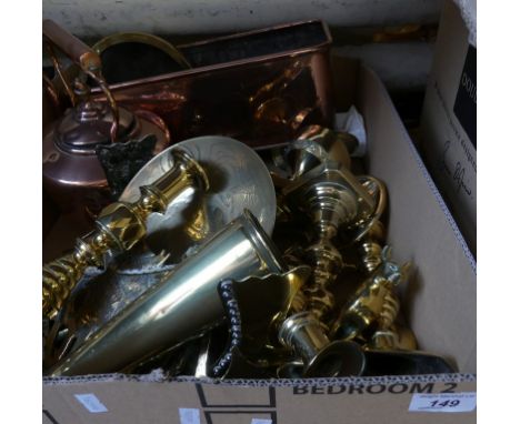 A mixed lot of copper and brass wares to include planter, kettle, candlesticks, various shoe shaped ornaments, door stops, Bu