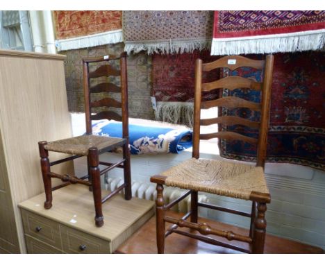 A pair 19th Century elm and oak ladder back dining chairs 