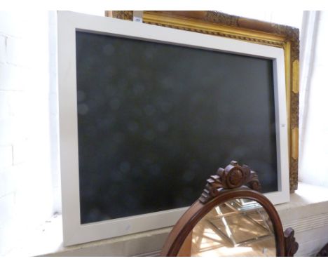 A contemporary white framed blackboard/back board panel