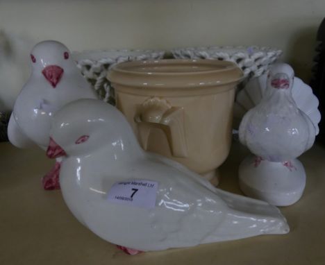 A mixed lot comprising modern Spanish jardinieres together with three model doves. CONDITION REPORT: Re-offer please no reser