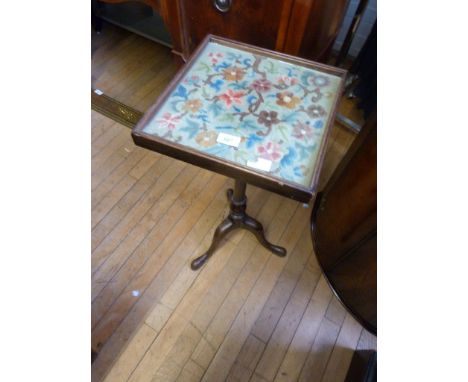 A late 19th/early 20th Century mahogany tripod table with tapestry inset top panel 