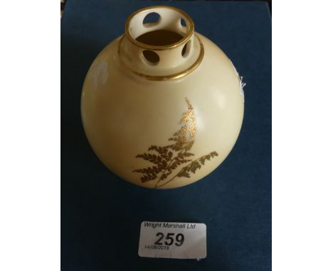 A Royal Worcester small pot pourri jar of globular form, decorated with foliage, pattern no 1039.