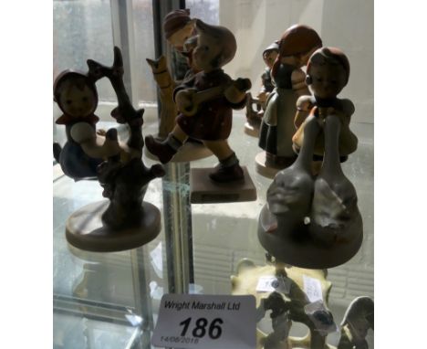 A collection of seven various Goebel Hummel figures of children.   CONDITION REPORT:  Figures in good condition: Prayer befor