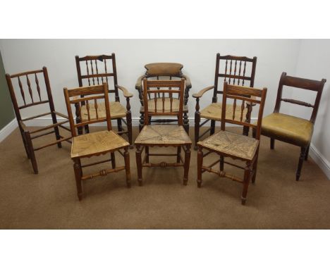 Set of three 19th century elm cane seat chairs, pair of ladder back elbow chairs a smokers bow type chair and two others (8) 