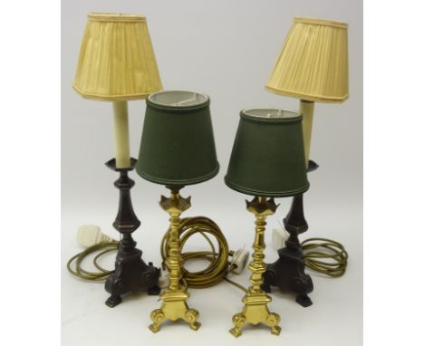Pair 19th century style brass candlesticks with knop stem on tripod feet and a similar pair of cast metal candlesticks with c