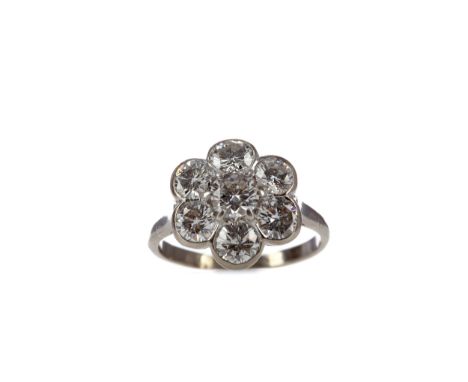 DIAMOND FLOWER CLUSTER RING, set with round brilliant cut diamonds totalling approximately 2.20 carats, partially marked '&am