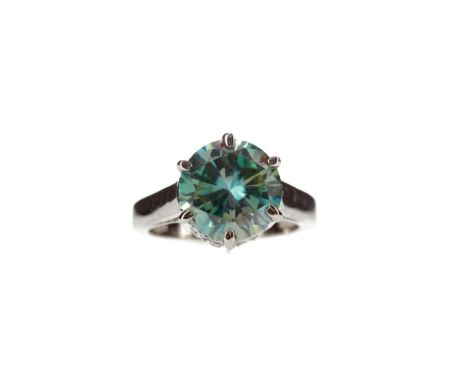 BLUE MOISSANITE RING, set with a round blue moissanite 12mm in diameter, unmarked, likely silver, size Q, 6.2g