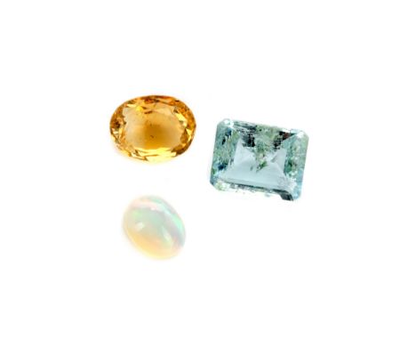 **THREE CERTIFICATED UNMOUNTED GEMS, including a 3.20 carat aquamarine, 2.80 carat citrine and a 0.77 carat opal, each with a