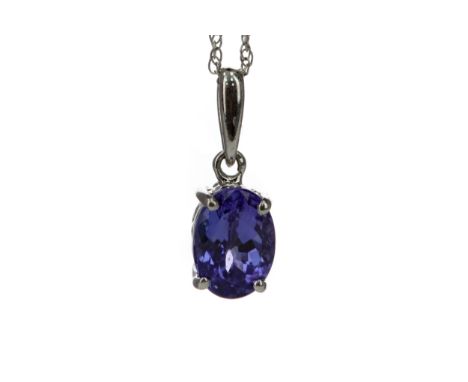 TANZANITE PENDANT, set with an oval tanzanite 7.52mm long, marked 14K, on a chain marked 375, 1.5g