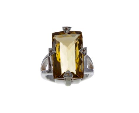YELLOW GEM SET RING, with a faceted yellow gem 19mm long, with four moissanite set claws, unmarked likely silver, size M, 10.