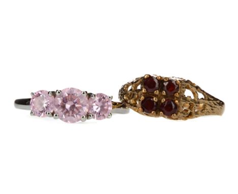 TWO GEM SET RINGS, including a pink gem set three stone ring, in fourteen carat gold, size S, 2.7g, along with a nine carat g