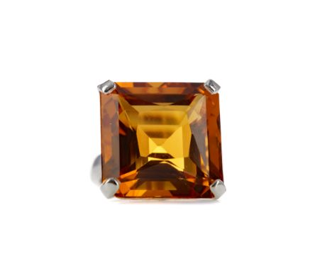 CITRINE RING, set with a step cut citrine 18.7mm wide, unmarked, likely silver, size N, 12.9g