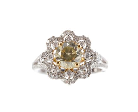 DIAMOND DAISY RING, set with a central round brilliant cut yellow diamond of approximately 1.36 carats surrounded by colourle