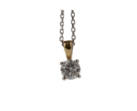 DIAMOND SOLITAIRE PENDANT, the round brilliant cut diamond of approximately 0.75 carats, marked 750, on an eighteen carat whi