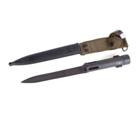 A Belgium FAL bayonet with scabbard and frog, 32cms long.