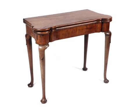 A George III mahogany card table on turned legs terminating in pad feet, 84cms wide.Condition ReportGeneral wear. The top is 