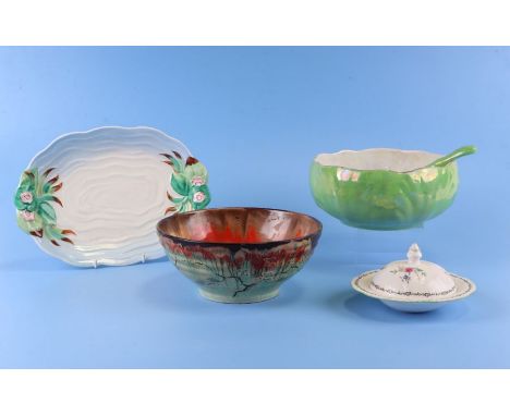 A Clarice Cliff bowl decorated with trailing flowering foliage, model no. 5503; A Clarice Cliff dish; a Maling salad bowl; to