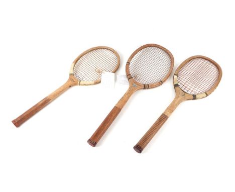 Three early 20th century wooden tennis racquets comprising Spalding A G &amp; Bros London The Vintage Racquet (circa 1920); t