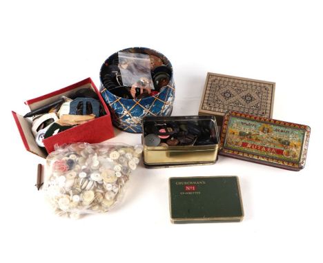 A large quantity of vintage buttons and advertising tins.