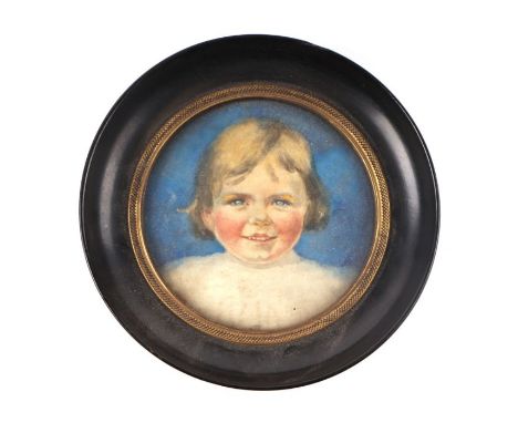 An early 20th century portrait miniature on paper depicting a young girl, framed &amp; glazed, 9.5cms diameter.