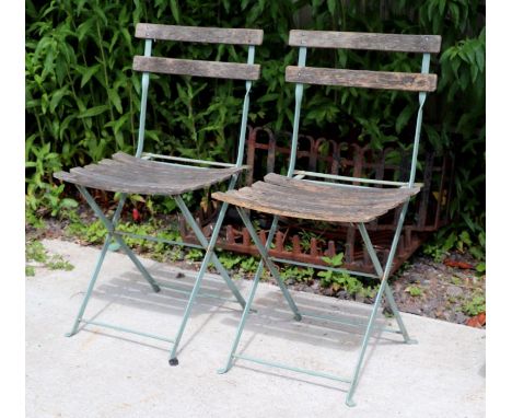 A pair of vintage French folding garden chairs (2).