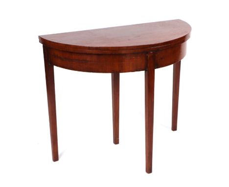 A Georgian style mahogany D-end fold-over card table on square tapering legs, 92cms wide.