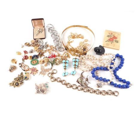 A quantity of vintage Trifari costume jewellery including angel fish and horse head brooches together with other costume jewe