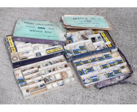 Three AMAL carburettor service kits for 6/900 series carburettors, monoblock carburettor and another, all boxed, completeness