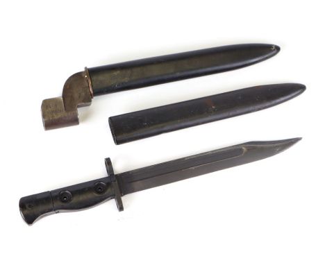 A British No. 9 Mk. 1 No. 4 rifle bayonet with metal scabbard, 28cms long; together with a British SLR bayonet with scabbard 