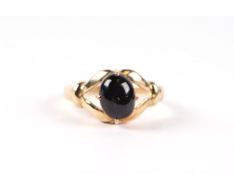 A 9ct gold and cabochon stone open claw set ring, approx UK size N, 2.9g.