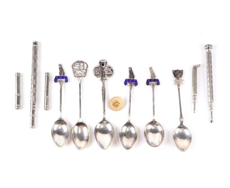 A set of three silver and enamel teaspoons with Siamese Cat Club initials and cat finials, 48g; together with another teaspoo