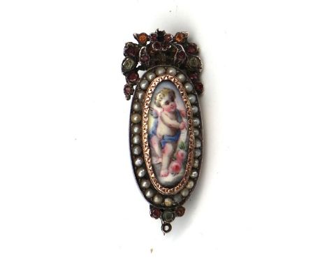 A Georgian white metal brooch with central portrait miniature depicting a cherub within a yellow metal mount with seed pearls