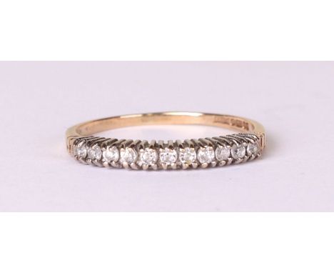 A 9ct gold white stone set half eternity ring, approx UK size 'Q', 1.4g.