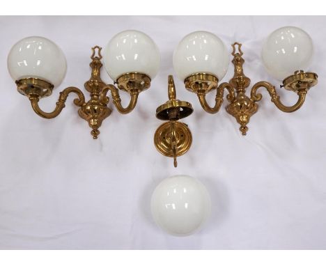 PAIR OF GILT BRASS AND STEEL WALL LIGHTS
each with a tapering and shaped back plate with a pair of scroll arms, together with