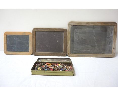THREE GRADUATED SLATE CHALK BOARDS
all with beech frames with one marked 'Holmes Dunlop Slate', together with a tin of colour
