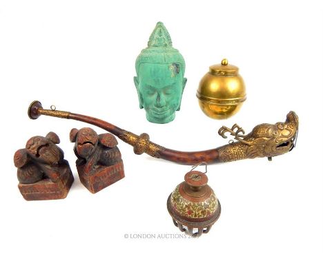 A bronzed cast metal head of the Buddha (19cm high) and other collectables: a dragon form horn, a pair of naively carved wood