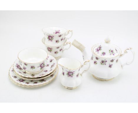 Royal Albert tea for two set in the Sweet Violets pattern to include a small teapot, two cups, two saucers, two side plates, 