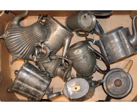 A collection of pewter items to include tea and coffee pots together with an equestrian prize caddy. (Qty)