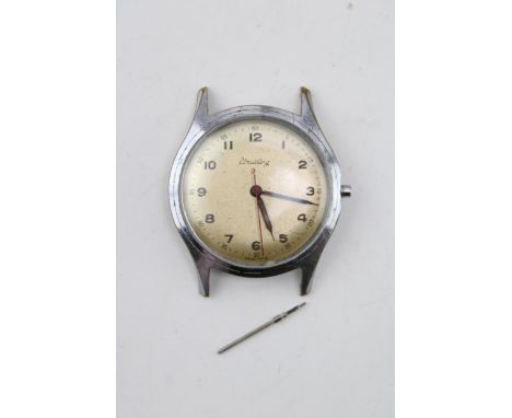 Vintage Breitling gentleman's wristwatch. Patina dial with red second hand. Stainless steel case. Case diameter 34mm.  Watch 