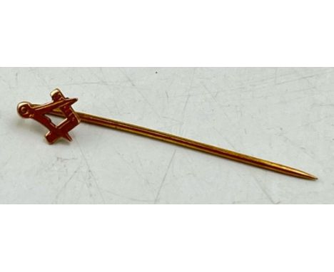 A 9ct yellow gold Masonic stick pin marked .375. Weight 0.5g. Length 38mm.