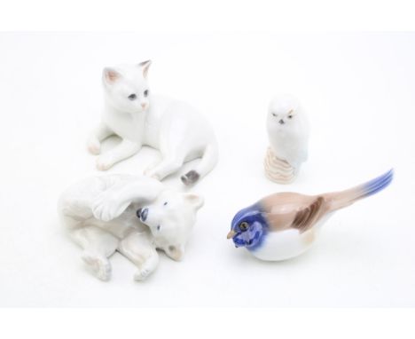 Royal Copenhagen animal figures to include a polar bear 729, a cat 504, a snowy owl and a Bing &amp; Grondahl bird (4).  In g