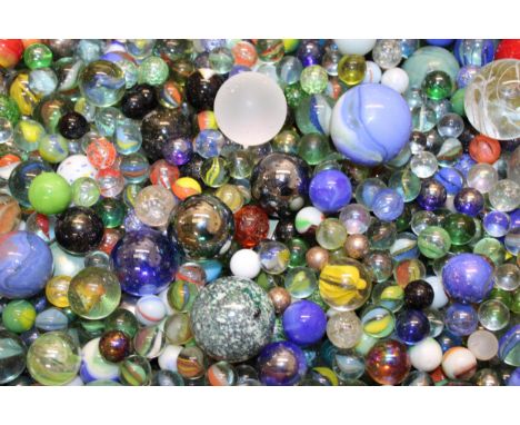 A mixed collection of vintage and antique marbles. (Qty)