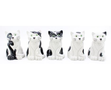 A collection of Wade cat money boxes in five different designs. Height 16.5cm. (5)