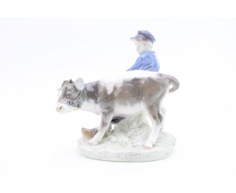 Royal Copenhagen Boy with Calf 772.  In good condition with no obvious damage or restoration.